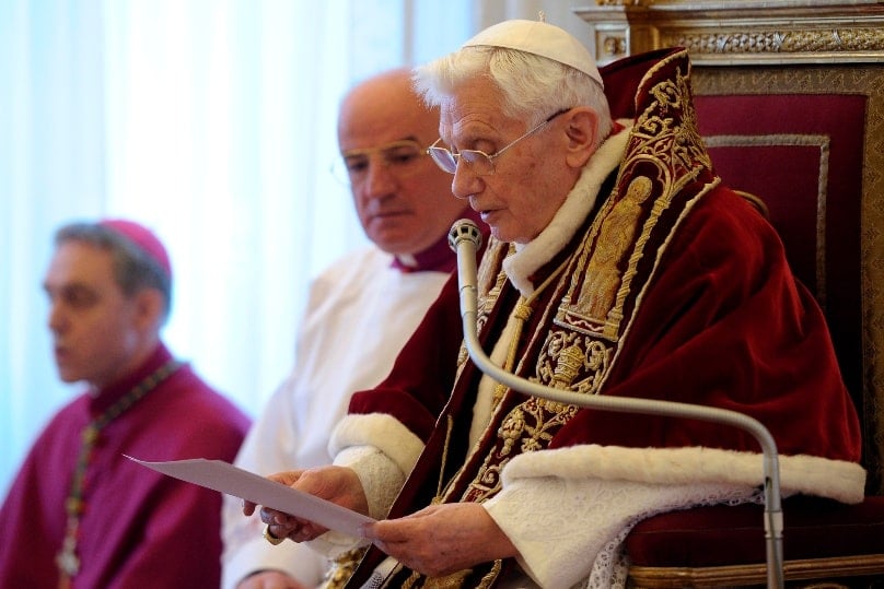 Pope Benedict XVI reads his resignation in Latin during a meeting of cardinals at the Vatican on 11 February, 2013. Photo: CNS/L'Osservatore Romano