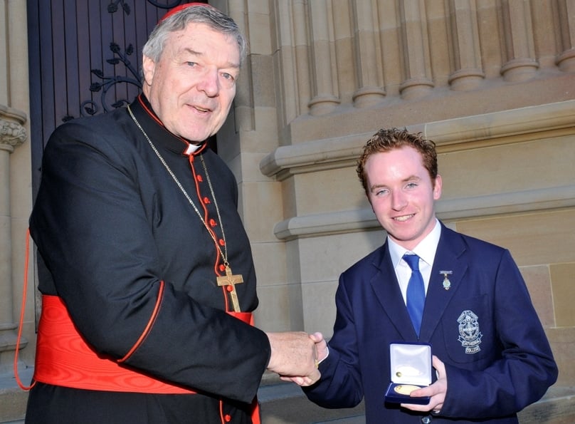 Cardinal Pell presents an Archbishop's Award for Student Excellence to Jake Ryan of St Mary's Cathedral College.