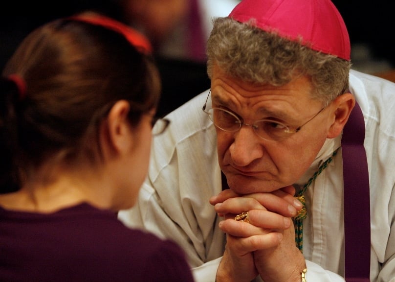 Bishop David Zubik of Pittsburgh listens to confession from a young woman during a rally for life and youth Mass in Washington in January 2010. Photo: CNS/Bob Roller 
