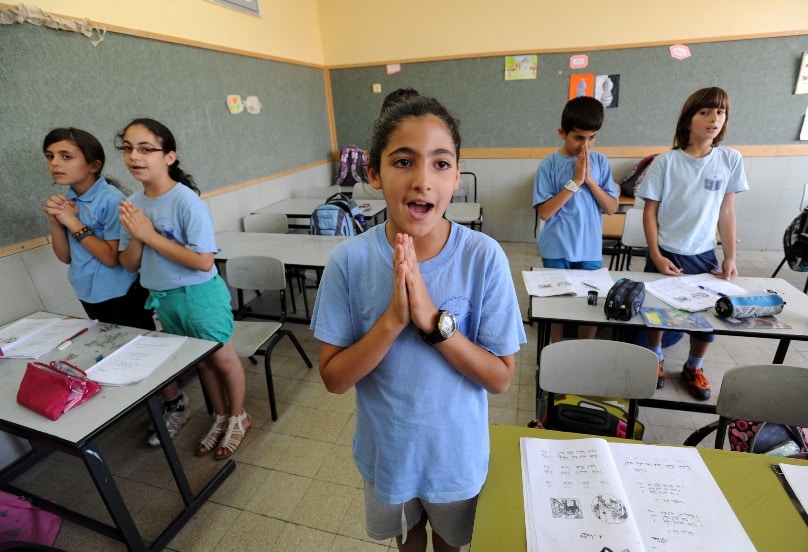 Israeli-Arab students pray in Aramaic during language class at Jish Elementary School in Jish, Israel, in June 2012. Photo: CNS/Debbie Hill