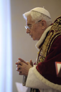 Pope Benedict XVI attends a Feb. 11, 2013, meeting with cardinals at the Vatican where he announced he would resign at the end of that month. When Pope Benedict announced that he would become the first pope in nearly 600 years to resign, speculation was as varied as it was excited about the long-term consequences of his historic act. (CNS photo/L'Osservatore Romano via Reuters) (Feb. 11, 2014) See VATICAN LETTER Feb. 11, 2014.