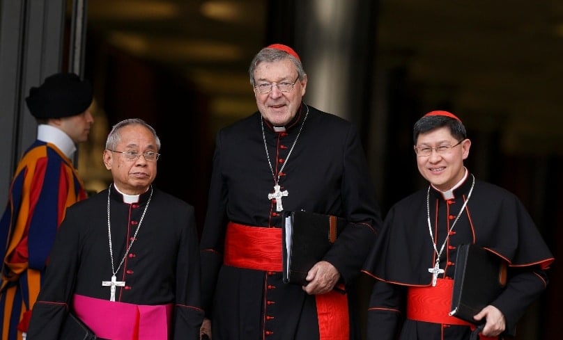 Prefect of the Secretariat for the Economy Cardinal George Pell with  Cardinal Luis Tagle of Manila and Cardinal Orlando Quevedo of Cotabato, Philippines, leave a meeting with Pope Francis in the synod hall at the Vatican on 20 February, 2014. Photo: CNS