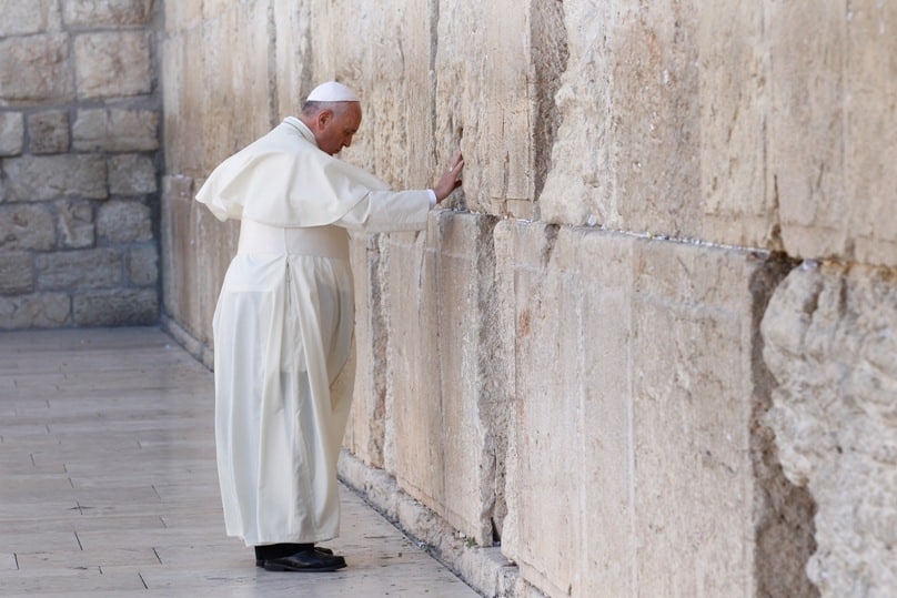 Pope Francis prays at the Western Wall in Jerusalem in May 2014. Photo: CNS/Paul Haring 