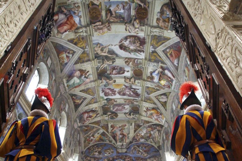 Swiss Guards attend a Mass in the Sistine Chapel at the Vatican in this 2006 file photo. Photo: CNS/Maurizio Brambatti, pool via Reuters 