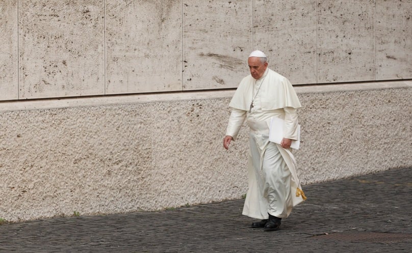 Pope Francis arrives at the 2014 synod. Photo: CNS