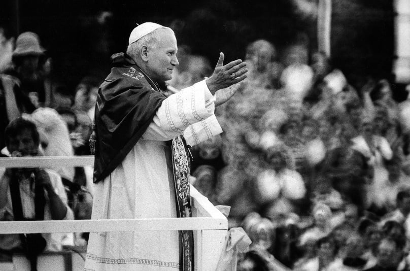 Pope John Paul II greets throngs of Poles waiting for a glimpse of their native son at the monastery of Jasna Gora in Czestochowa during his 1979 trip to Poland. Photo: CNS/Chris Niedenthal