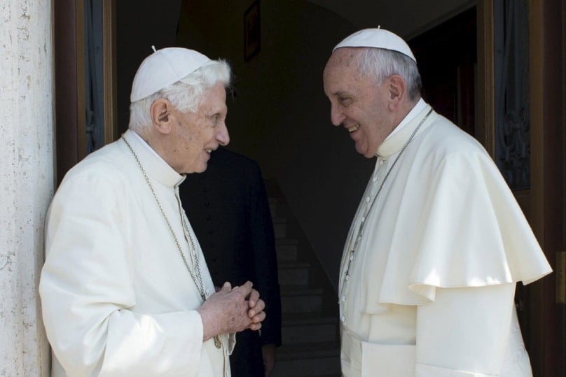 Retired Pope Benedict XVI talks with Pope Francis during a meeting at the Vatican on 30 June, 2015. Photo: L'Osservatore Romano via Reuters