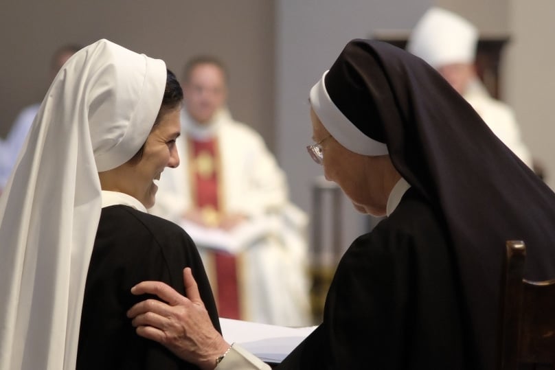 Sr Agnes Clare Girard talks with Mother Ann Marie Karlovic after making her first profession of vows as a Dominican Sisters of St Cecilia in Nashville in July. Photo: CNS/Rick Musacchio, Tennessee Register