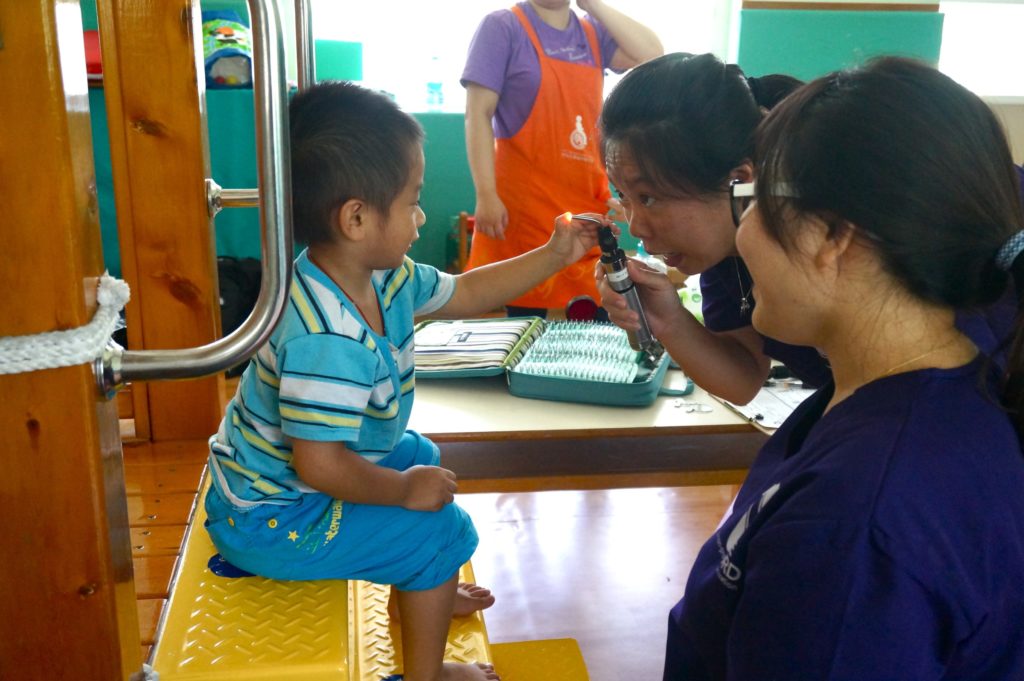 In this undated photo, Dr Kelly Kao and Judy Chang engage a young patient at Qishan Child Early Intervention and Development Center in Kaohsiung City, Taiwan. Photo: CNS /courtesy Catholic San Francisco