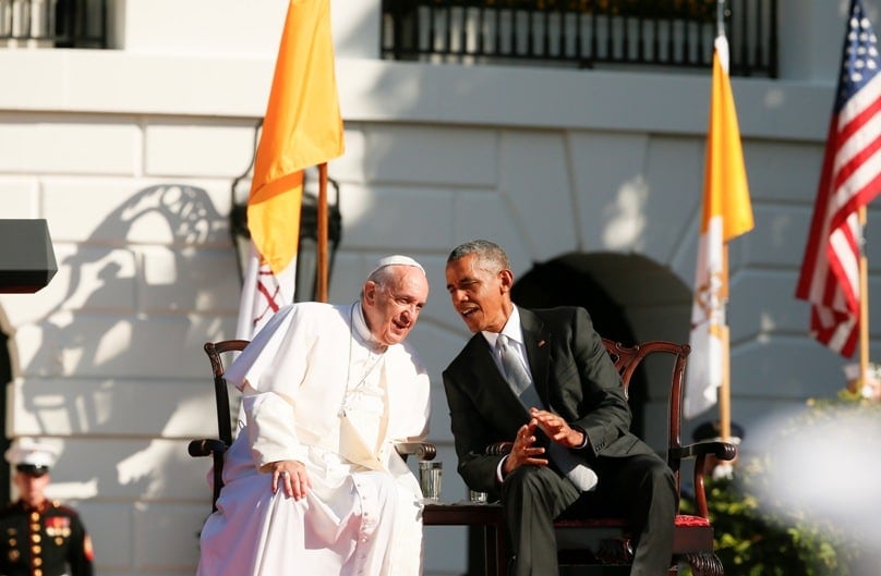 U.S. President Barack Obama leans in to talk to Pope Francis during a ceremony on the South Lawn of the White House in Washington on 23 September. Photo: CNS/Paul Haring