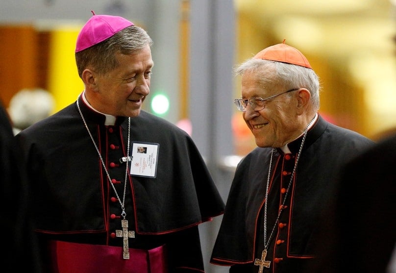 Two progressive heavyweights, Archbishop Blase Cupich of Chicago talks with German Cardinal Walter Kasper as they leave the opening session of the Synod of Bishops on the family at the Vatican on 5 October. Photo: CNS photo/Paul Haring.