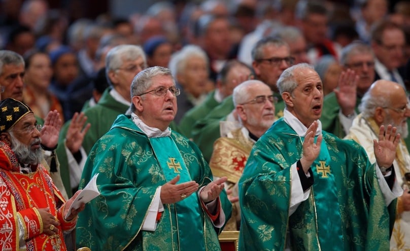 Prelates attend the closing Mass of the Synod of Bishops on the family celebrated by Pope Francis in St Peter's Basilica on 25 October. Photo: CNS/Paul Haring 