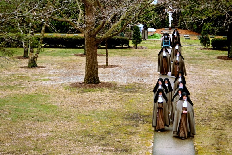 In this 2010 photo, Poor Clare Colettine nuns walk back to their Corpus Christi Monastery after a funeral service for one of the closister's elderly sisters. Photo: CNS/Abbie Reese