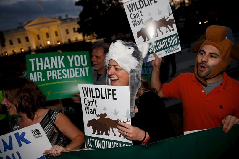 A group of activists gather outside the White House in Washington to celebrate the Obama administration's rejection of the Keystone XL pipeline. Photo: CNS/Jonathan Ernst, Reuters