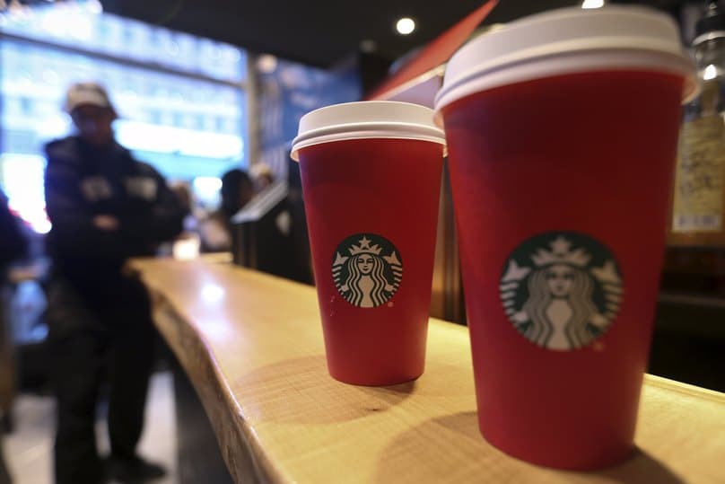 Starbucks holiday cups are pictured on a counter at a Times Square Starbucks in New York City. Photo: CNS/Carlo Allegri, Reuters