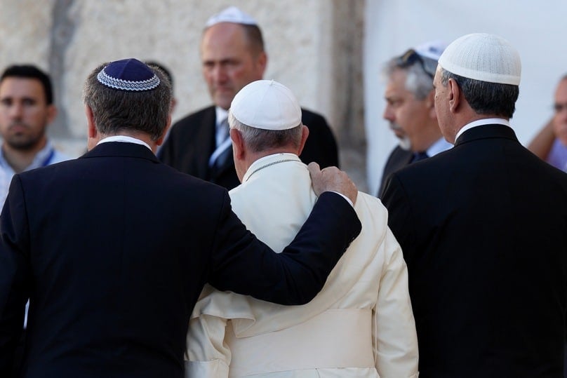 Pope Francis walks with Argentine Rabbi Abraham Skorka, left, and Omar Abboud, a Muslim leader from Argentina, as he leaves after praying at the Western Wall in Jerusalem in this May 2014 file photo. Photo: CNS/Paul Haring 