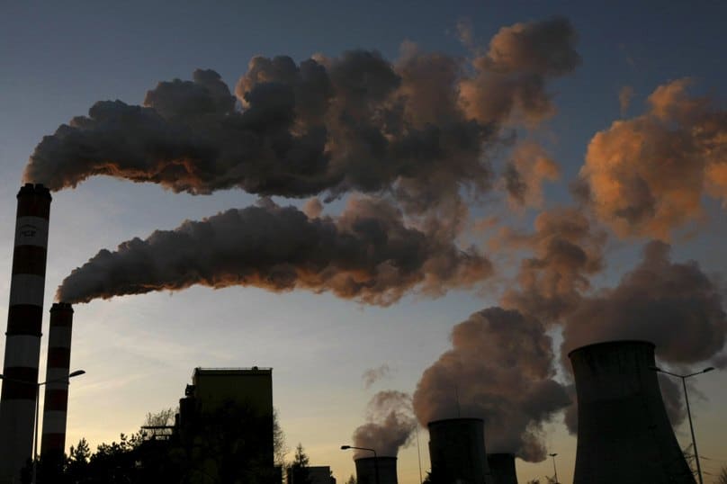 Smoke billows from the chimneys of power plant in 2014 in Belchatow, Poland. Photo: CNS/Kacper Pempel, Reuters
