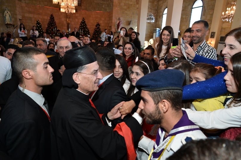 Lebanese Cardinal Bechara Rai, patriarch of the Maronite Catholic Church, greets people after celebrating Mass at Our Lady of the Annunciation Cathedral in Tartus, Syria, on 7 December. Photo: CNS/Mychel Akl for Bkerke, Maronite patriarchate