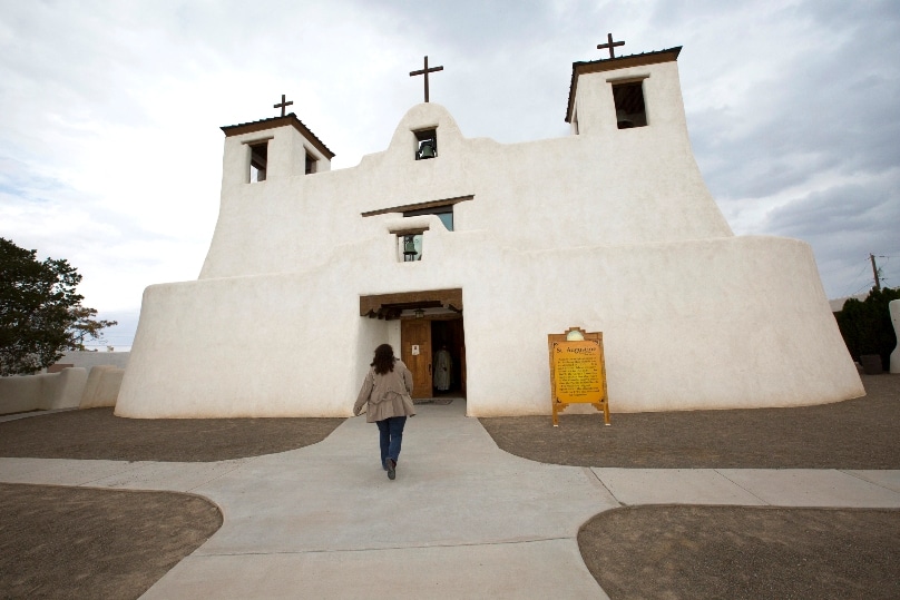A woman arrives for Mass at St Augustine Mission in the Pueblo of Isleta in New Mexico last November 2015. Photo: CNS/Nancy Wiechec