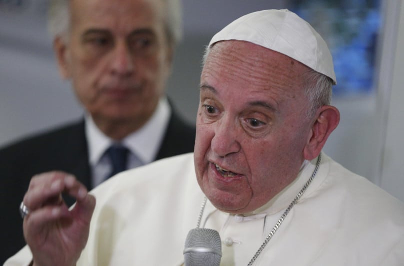 Pope Francis answers questions from journalists aboard his flight from Ciudad Juarez, Mexico, to Rome on 17 February. Photo: CNS/Paul Haring