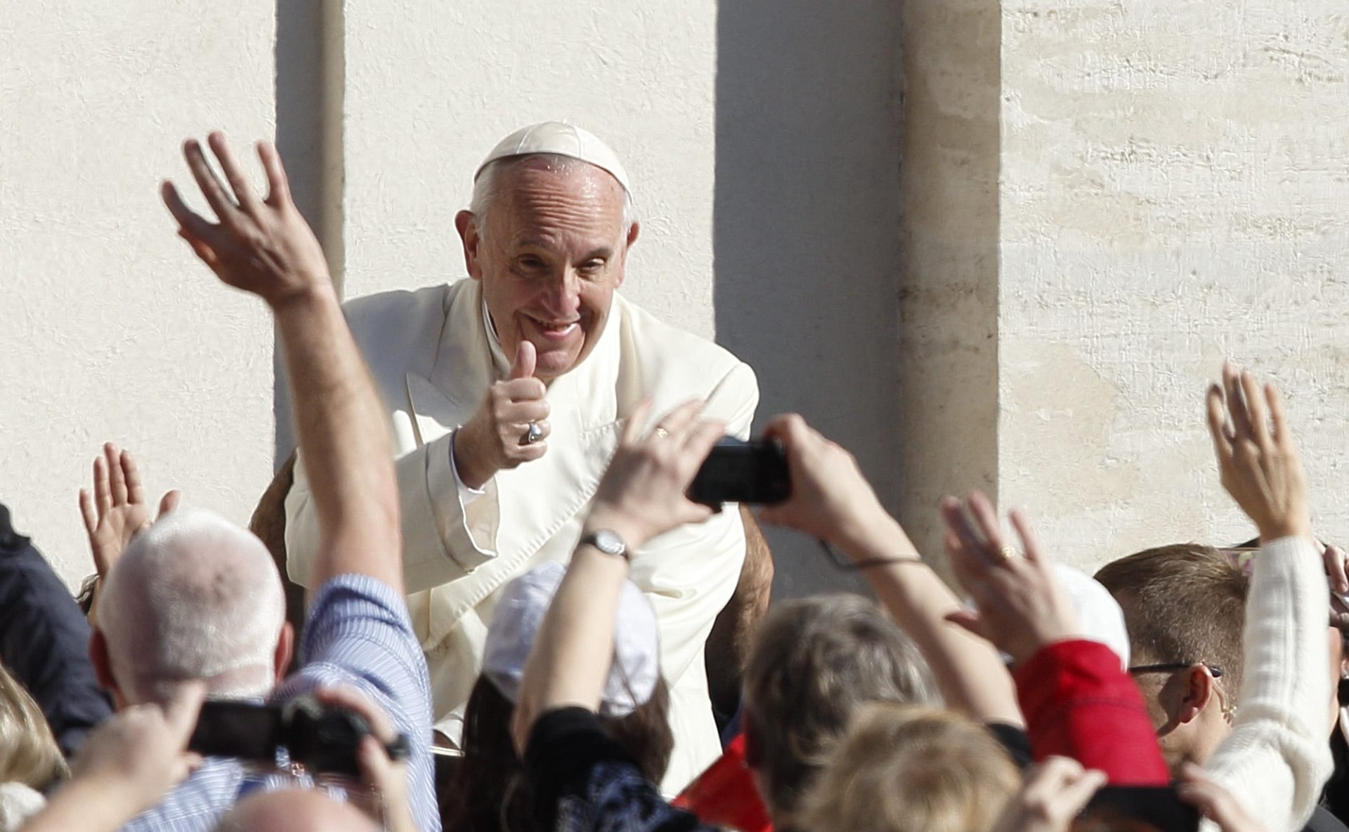 Pope Francis gives a thumbs up as he greets the crowd during his general audience in St. Peter's Square at the Vatican on 2 March. Photo:  CNS/Paul Haring