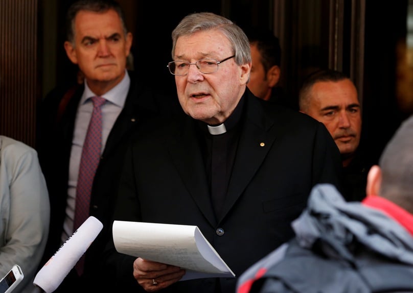 Cardinal George Pell reads a statement to media in front of the Hotel Quirinale in Rome on 3 March.  Photo: CNS/Paul Haring