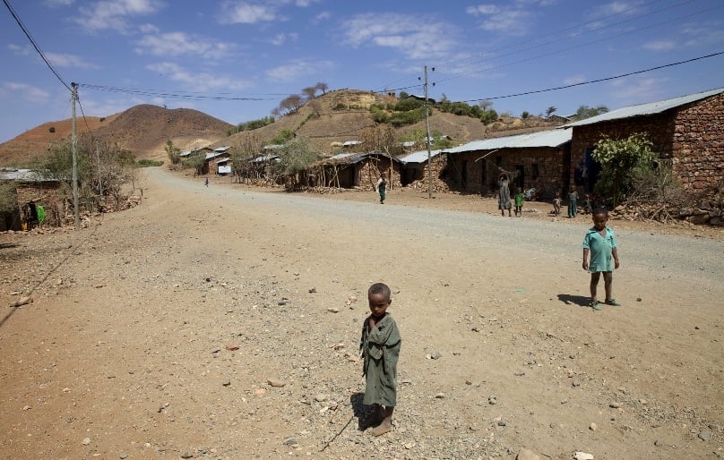 Children stand along a road in the Amhara region of Ethiopia. Photo: CNS/Katy Migiro, Reuters