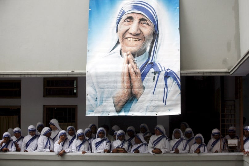 A poster of Blessed Teresa of Kolkata and Missionaries of Charity are seen in Kolkata, India, in this September 2007 file photo.Photo: CNS/Jayanta Shaw, Reuters