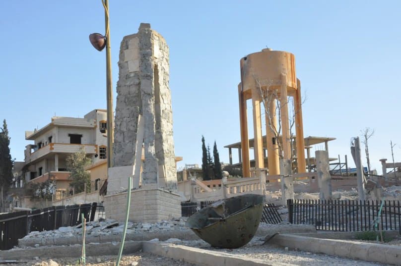 A view shows the damage in the town of Qaryatain, Syria, on 4 April, after forces loyal to Syrian President Bashar Assad recaptured it. Photo: Syrian National News Agency via Reuters