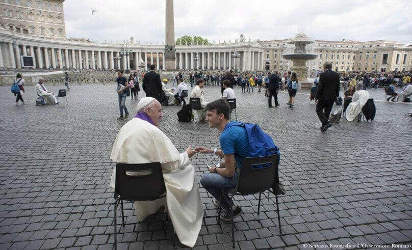 Pope Francis hears confession from a teenager in St Peter’s Square at the Vatican. Youth from around the world flocked to Rome in April for a special Year of Mercy event for teens aged 13-16. Photo: Angelo Carconi, EPA