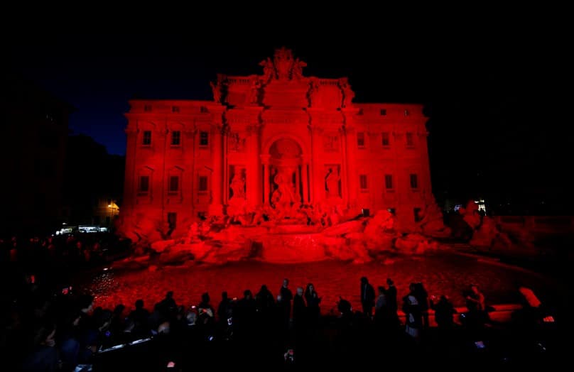 The Trevi Fountain in Rome is lit in red during an event to raise awareness of the plight of Christian martyrs on 29 April 2016. Photo: CNS