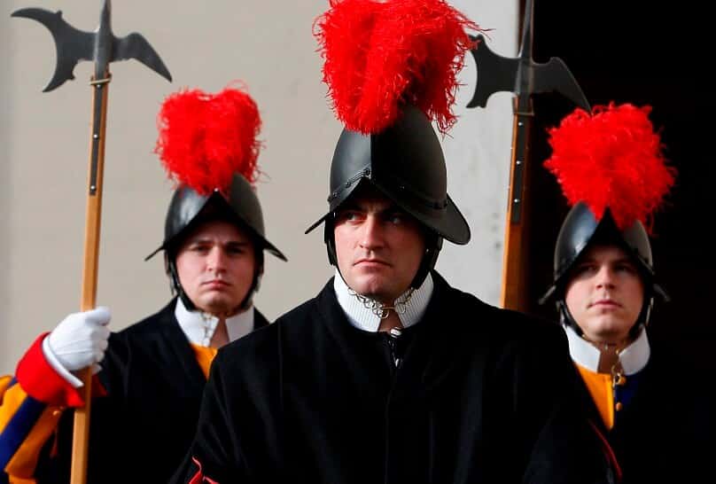 Swiss Guards stand in the San Damaso Courtyard at the Vatican in this Dec 2015 file photo. Photo: CNS/Paul Haring