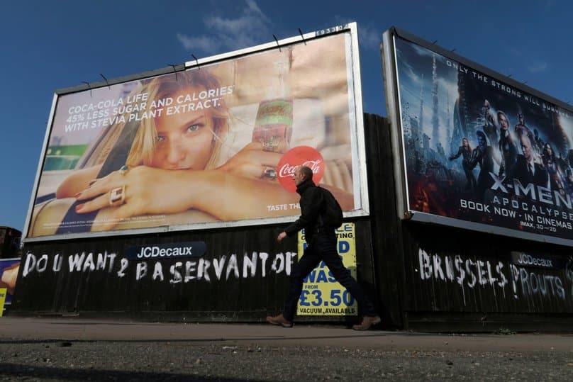 A man walks past a "Brexit" billboard on 12 May in Leamington Spa, England.Photo: CNS/Russell Boyce, Reuters