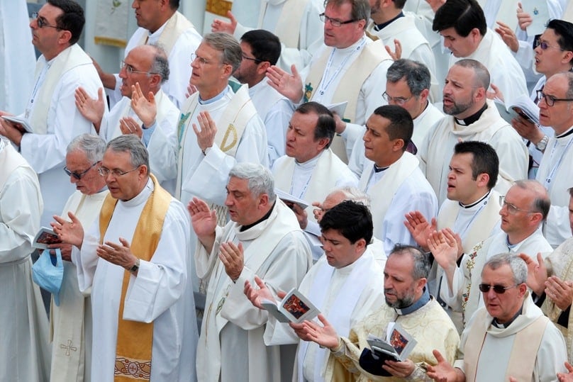 Priests pray the Lord's Prayer as Pope Francis celebrates Mass for the Jubilee of Priests in St Peter's Square at the Vatican on 3 June. The Mass was an event of the Holy Year of Mercy. Photo: CNS/Paul Haring