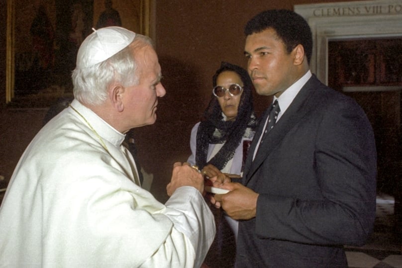 Pope John Paul II meets with Muhammad Ali in 1982 at the Vatican. Little did each know that they would later both suffer from Parkinson's. Photo: CNS/Catholic Press Photo