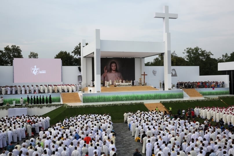 Bishops bishops and priests attend the opening Mass for World Youth Day on 26 July at Blonia Park in Krakow, Poland. Photo: CNS/Bob Roller