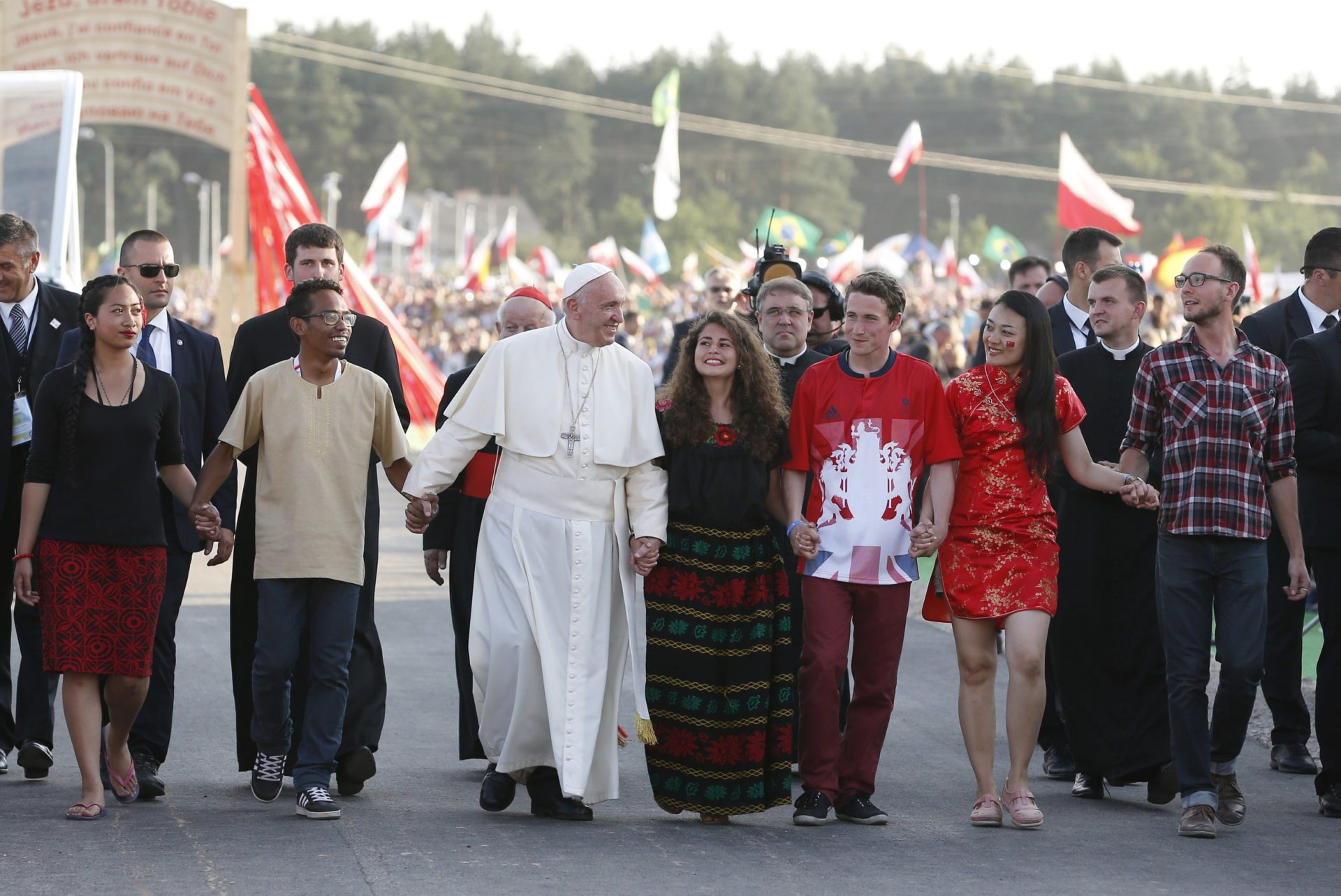 Pope Francis walks with World Youth Day pilgrims as he arrives for a 30 July prayer vigil at the Field of Mercy in Krakow, Poland. Photo: CNS photo/Paul Haring