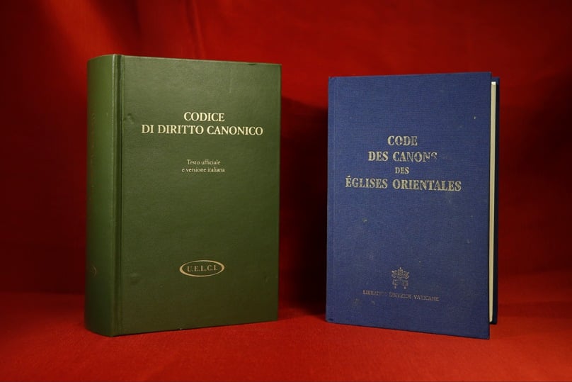 Code of Canon Law books for the Latin and Eastern Catholic churches. Pope Francis has ordered changes to the Latin Code of Canon Law to harmonise the laws of the Latin and Eastern Catholic churches on several issues involving the sacraments of baptism and marriage. Photo: CNS/Paul Haring