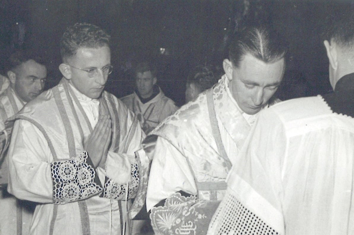Fr Kevin, at right, as a newly ordained priest.