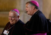 Archbishop Charles J. Chaput of Philadelphia and Archbishop Anthony Fisher OP of Sydney leave the opening session of the Synod of Bishops on young people, the faith and vocational discernment at the Vatican on 3 October. PHOTO: CNS photo/Paul Haring