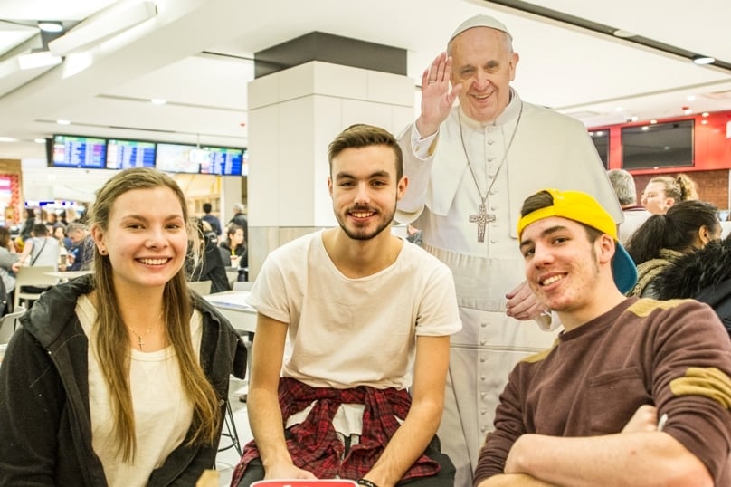 Liam McMahon (right) with fellow WYD pilgrims before departing Sydney on 16 July. Photo: Giovanni Portelli