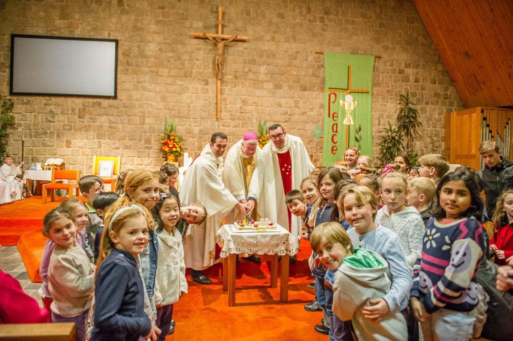 Fr Michael Lanzon, Bishop Terry Brady and Fr John Knight concelebrated the parish's 80th anniversary Mass. Photo: Giovanni Portelli