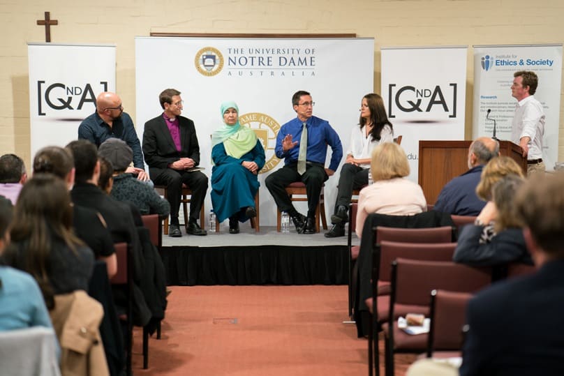 US theologian William Cavanaugh responds to a question at Notre Dame’s QndA event on 20 July, pictured with fellow panellists Melinda Tankard Reist (right), Maha Abdo, Anglican Bishop Michael Stead and Scott Stephens. Photo: Patrick J Lee 