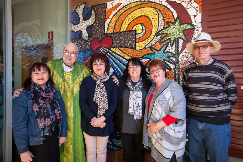 Artist Katie Ng, at far left, with Fr Carroll and the parish team who helped bring the idea to life. Photo: Patrick J Lee