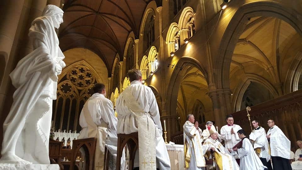 Archbishop Anthony Fisher OP presides over the ordination of Sydney's newest priests, Fr Daniele Russo and Fr Joseph Hamilton, at St Mary's Cathedral on 3 June. Photo: Giovanni Portelli
