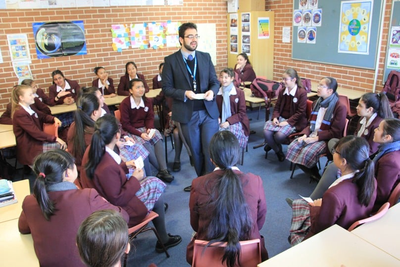 Anthony Ndaira teaches a class at Mary MacKillop College.