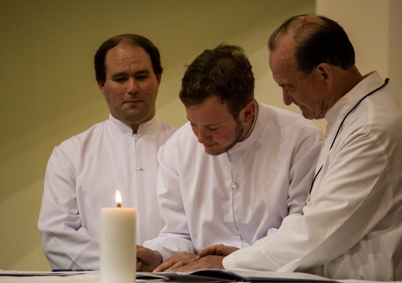 Br Jack O’Sullivan signs the vows register under the watchful gaze of Br James Hodge and Marist Provincial Br Jeffrey Crowe. Brs James and Jack made their first profession of vows on 15 August.