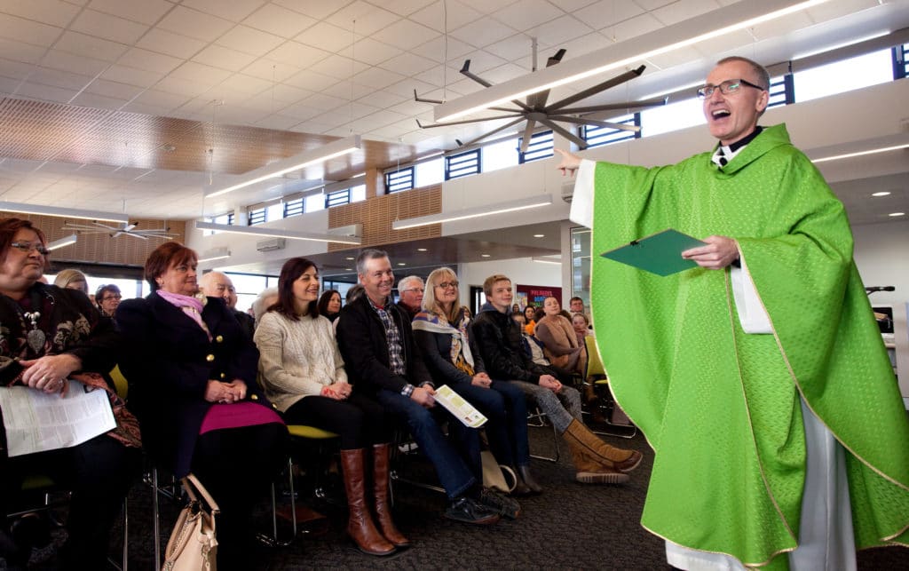 Fr David Catterall at the inaugural Mass for St Mary MacKillop parish, Oran Park. Photo: Jenny Yuen 