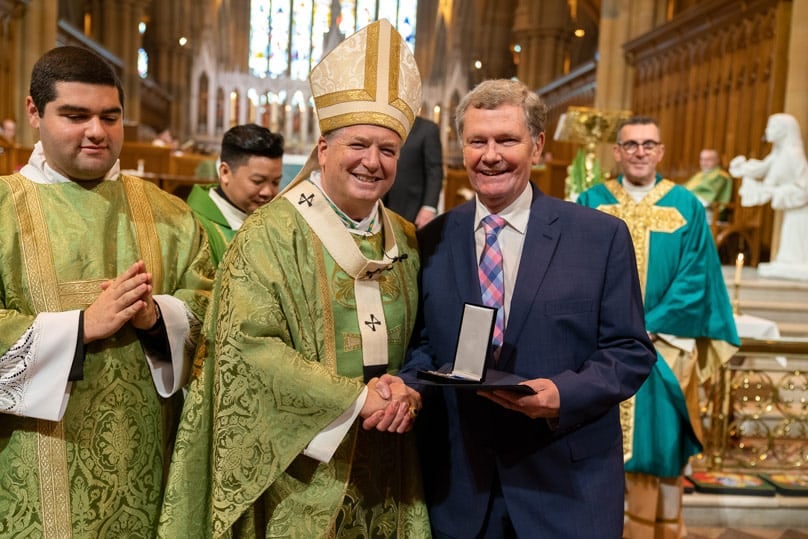 Archbishop Fisher and Mike Bailey. PHOTO: Patrick J Lee