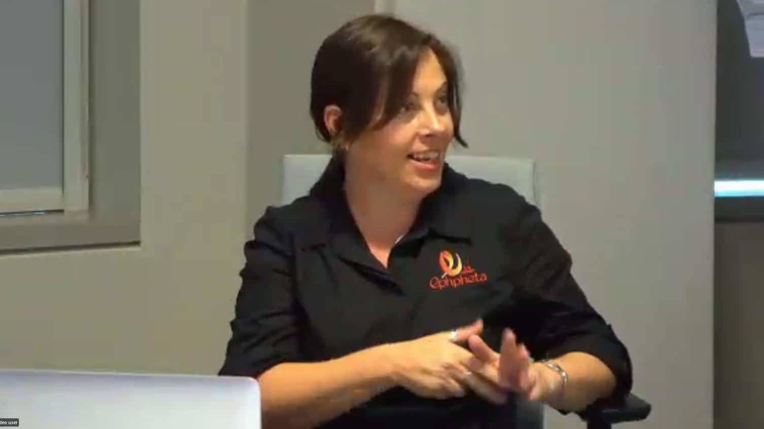 Interpreter Nicole Clark signing during the website launch.